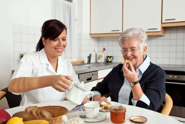 senior care worker with client
