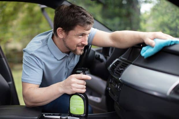 auto detailer working