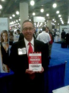 Joel Libava in New York City with his 1st book