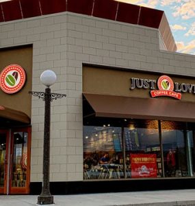 image of the exterior of a just love coffee cafe franchise