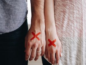 X's on hands